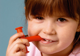 Chewy Tube red silicone chew toy. Sold at Doernbecher Children's Hospital &  made in Maine: non-detect for Cadmium.